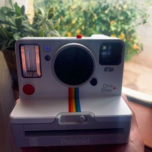 Rechargeable Polaroid camera. Film not included,